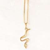 Vintage necklace with 14K yellow gold chain and 14K yellow and white gold snake pendant, 70s