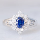 Anello a margherita vintage in platino con zaffiro (0.30ct) e diamanti (0.32ctw), anni ‘80