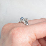 Anello a margherita vintage in platino con zaffiro stellato (0.71ct) e diamanti (0.27ctw), anni ‘80/‘90