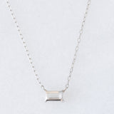 Collana vintage in platino con diamante di taglio smeraldo (0.30ct)