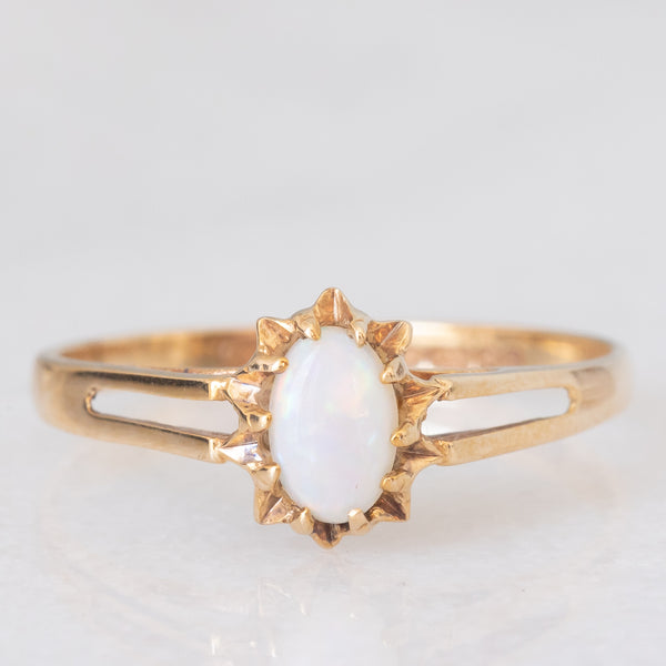 Solitario vintage in oro giallo 9K con opale (0.25ct ca.), anno 1982