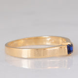 Solitario a fascia vintage in oro giallo 14K con zaffiro di taglio carré (0.18ct ca.), anni ‘70
