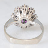 Anello a fiore vintage in oro bianco 14K con rubini (0.56ctw ca.) e diamanti di taglio brillante (0.40ctw ca.), anni ‘70