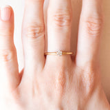 Vintage-Solitär aus 18 Karat Gelb- und Weißgold mit Diamant im Brillantschliff (ca. 0.15 ct), 60er Jahre