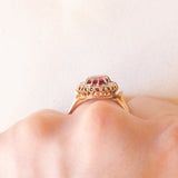 Antique 18K yellow gold daisy ring with synthetic ruby (1.60ct approx.) and rose cut diamonds (0.24ctw approx.), early 900s