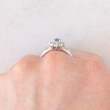 Anello a margherita vintage in platino con zaffiro (0.51ct) e diamanti (0.43ctw), anni ‘90