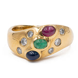 Vintage-Ring aus 18 Karat Gelbgold mit Rubin, Saphir, Smaragd und Diamant (0.30 ctw), 70er Jahre