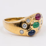 Vintage-Ring aus 18 Karat Gelbgold mit Rubin, Saphir, Smaragd und Diamant (0.30 ctw), 70er Jahre