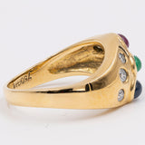 Vintage-Ring aus 18 Karat Gelbgold mit Rubin, Saphir, Smaragd und Diamant (0.30 ctw), 70er Jahre