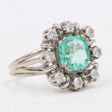 Vintage-Ring aus 18 Karat Weißgold mit Smaragd (1,4 ct) und Diamanten (0,40 ctw), 60er Jahre