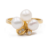 Vintage-Ring aus 14-karätigem Gelbgold mit Perle und Diamant (0.09 ctw), 70er Jahre