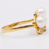 Vintage-Ring aus 14-karätigem Gelbgold mit Perle und Diamant (0.09 ctw), 70er Jahre