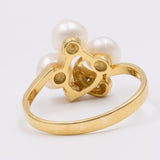 Vintage-Ring aus 14-karätigem Gelbgold mit Perle und Diamant (0.09 ctw), 70er Jahre