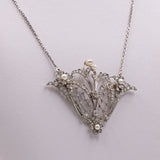 Jugendstil-Halskette aus 18 Karat Weißgold mit Diamanten im Altschliff, Rosetten und Perlen, 20er Jahre