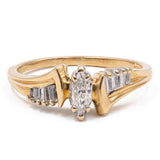 Vintage-Ring aus 14-karätigem Gelbgold mit zentralem Diamanten im Marquise-Schliff (ca. 0.25 ct) und seitlichen Diamanten im konischen Schliff, 70er/80er Jahre