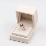 Vintage-Ring aus 14-karätigem Weißgold mit Diamanten (0,94 ctw) und Rubinen (0.80 ctw), 60er Jahre