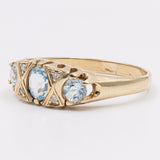 Vintage-Ring aus 9-karätigem Gelbgold mit blauem Topas (0.65 ct) und Diamanten, 1998