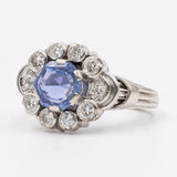 Vintage 18K white gold daisy ring with sapphire (approx. 2.30ct) and diamonds (approx. 0.80ctw), 60s