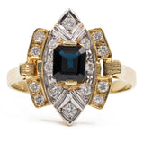 Vintage 14k two-tone gold ring with central sapphire (0.60ct) and diamonds (0.16ctw), 80s