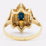 Vintage-Ring aus 14-karätigem zweifarbigem Gold mit zentralem Saphir (0.60 ct) und Diamanten (0.16 ctw), 80er Jahre