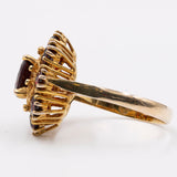 Anello vintage a margherita in oro giallo 8k e granati, anni '70