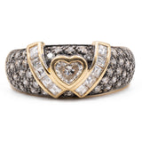 Двухцветное золотое кольцо с бриллиантом в форме сердца (0,35 карата) и бриллиантами (0,95 карата), 80-е годы.