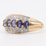 9k yellow gold ring with iolites and diamonds