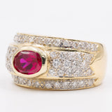 VINTAGE-BANDRING AUS 18K GELBGOLD MIT RUBIN (CA. 1.40 KT.) UND DIAMANTEN IM BRILLANTSCHLIFF (CA. 1 KT.), 70er/80er Jahre