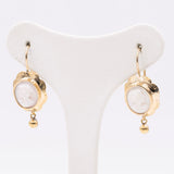 Orecchi vintage in oro giallo con cammei su conchiglia