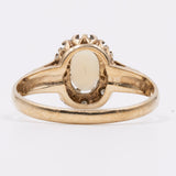 Anello in oro giallo 9K con opale (0.30ct ca.) e diamanti