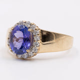 Vintage Gänseblümchenring aus 14-karätigem Gelbgold mit Tansanit (2.70 ct) und Diamanten (0.40 ctw)