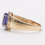 Vintage Gänseblümchenring aus 14-karätigem Gelbgold mit Tansanit (2.70 ct) und Diamanten (0.40 ctw)