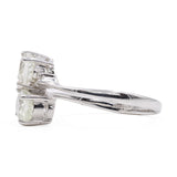 Anello vintage bypass in oro bianco 9k con hiddeniti e diamanti