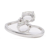 Anello vintage bypass in oro bianco 9k con hiddeniti e diamanti