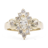 Vintage-Ring aus 14-karätigem Gelbgold mit zentralem Marquise-Diamant (0,40 ct) und Diamantkontur, 70er Jahre