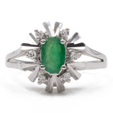 Bague vintage en or blanc 14 carats avec émeraude (environ 0.40 ct) et diamants (environ 0.06 ct au total), années 70