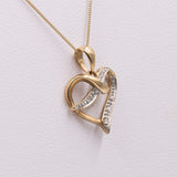 Collana vintage con ciondolo a cuore in oro giallo 9k e diamanti