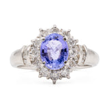 ANELLO A MARGHERITA VINTAGE IN PLATINO CON TANZANITE (1CT) E DIAMANTI (0.50CTW)