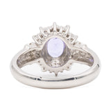 ANELLO A MARGHERITA VINTAGE IN PLATINO CON TANZANITE (1CT) E DIAMANTI (0.50CTW)