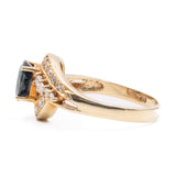 ANELLO TOURBILLON VINTAGE IN ORO GIALLO 14K CON ZAFFIRO (1.20CT CA.) E DIAMANTI (0.29CTW CA.), ANNI ‘80