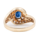 ANELLO TOURBILLON VINTAGE IN ORO GIALLO 14K CON ZAFFIRO (1.20CT CA.) E DIAMANTI (0.29CTW CA.), ANNI ‘80