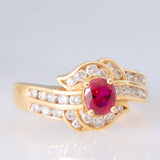 Anello a margherita vintage in oro giallo 18K con rubino (0.51ct) e diamanti (0.41ctw), anni ‘80/‘90