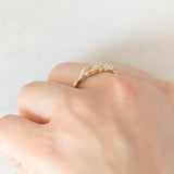 Anello vintage in oro giallo 9K con diamante e con design intrecciato, anno 1993