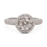 Anello vintage in platino 900 con diamante centrale di 0,59ct e diamanti di contorno (0,35ctw)