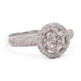 Anello vintage in platino 900 con diamante centrale di 0,59ct e diamanti di contorno (0,35ctw)
