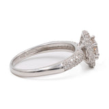 Anello vintage in platino 900 con diamante centrale di 0,59ct e diamanti di contorno (0,35ctw)