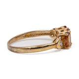 Anello trilogy in oro giallo 9k con granati arancioni (1,12ctw) e diamanti