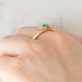 Vintage 9K yellow gold band ring with emerald (0.25ct approx.) and diamonds (0.12ctw approx.)
