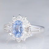 Anello a margherita vintage in platino con zaffiro (1.10ct) e diamanti (0.33ctw), anni ‘70