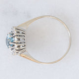 Bague marguerite vintage en or blanc 14 carats avec aigue-marine (environ 0.70 ct) et diamants taille brillant (environ 0.24 ct), années 70